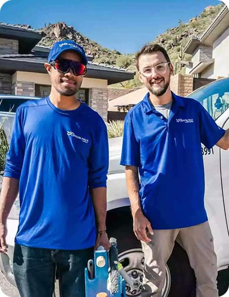 Two uniformed SPS PoolCare technicians ready to service a pool